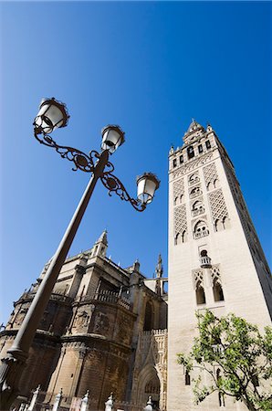 Seville Catheral and La Giralda, Plaza Virgin de los Reyes, Santa Cruz district, Seville, Andalusia (Andalucia), Spain, Europe Foto de stock - Sin royalties Premium, Código: 6119-08740178