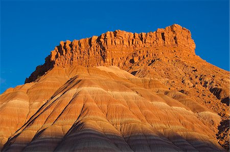 Cliffs at sunset, Paria Movie Set, Grand Staircase-Escalante National Monument, near Page, Arizona, United States of America, North America Stock Photo - Premium Royalty-Free, Code: 6119-08740241