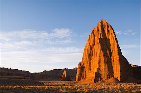 Sunrise at the Temple of the Sun and smaller Temple of the Moon in Cathedral Valley, Capitol Reef National Park, Utah, United States of America, North America Stock Photo - Premium Royalty-Free, Code: 6119-08740432