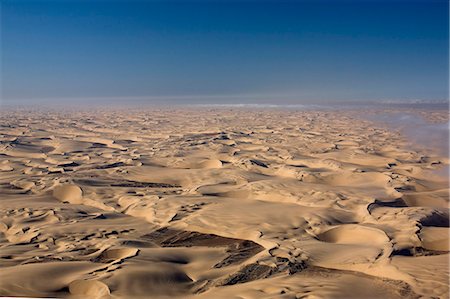 Aerial photo of sand dunes, Skeleton Coast Park, Namibia, Africa Stock Photo - Premium Royalty-Free, Code: 6119-08740763