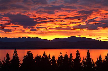 Sunrise, Lake Pukaki, Canterbury, South Island, New Zealand, Pacific Stock Photo - Premium Royalty-Free, Code: 6119-08740860