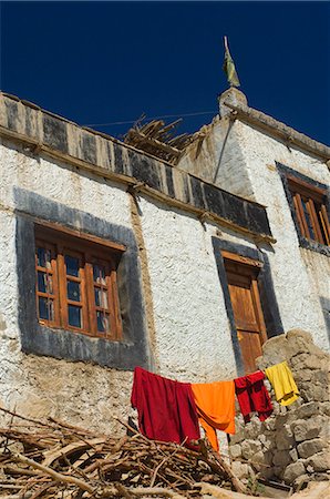 Monk's clothes on line, Tikse (Tiksay) gompa (monastery), Tikse (Tiksay), Ladakh, Indian Himalayas, India, Asia Stock Photo - Premium Royalty-Free, Code: 6119-08740925