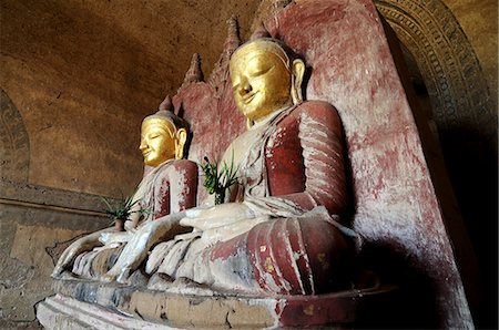 Sitting Buddha in a temple in Bagan, Myanmar, Asia Stock Photo - Premium Royalty-Free, Code: 6119-08741744