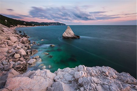 simsearch:6119-08797180,k - White cliffs frame the turquoise sea at sunrise, La Vela Beach, Portonovo, province of Ancona, Conero Riviera, Marche, Italy, Europe Stock Photo - Premium Royalty-Free, Code: 6119-08797186