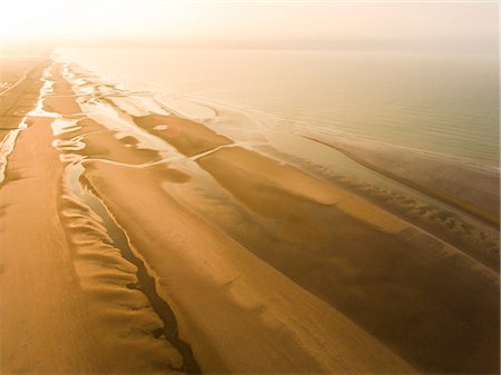 rye - Camber Sands Beach at sunrise, Camber, near Rye, East Sussex, England, United Kingdom, Europe Stock Photo - Premium Royalty-Free, Code: 6119-08797110