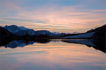 province of sondrio - Snowy peaks reflected in Lake Zana at sunrise, Malenco Valley, Valtellina, Province of Sondrio, Lombardy, Italy, Europe Stock Photo - Premium Royalty-Free, Code: 6119-08797213