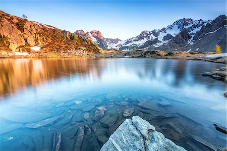 province of sondrio - Snowy peaks reflected in Lake Zana at sunrise, Malenco Valley, Valtellina, Province of Sondrio, Lombardy, Italy, Europe Photographie de stock - Premium Libres de Droits, Code: 6119-08797214