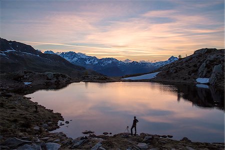 simsearch:6119-09074049,k - Photographer admires the pink sunrise on Lake Zana, Malenco Valley, Valtellina, Province of Sondrio, Lombardy, Italy, Europe Photographie de stock - Premium Libres de Droits, Code: 6119-08797215