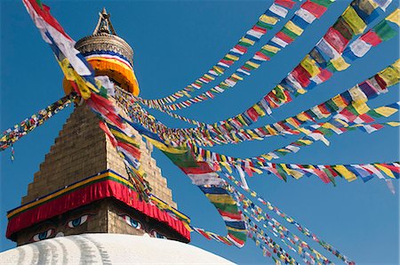 simsearch:6119-08268579,k - Bouddha (Boudhanath) (Bodnath) in Kathmandu is covered in colourful prayer flags, Kathmandu, Nepal, Asia Foto de stock - Sin royalties Premium, Código: 6119-08797374