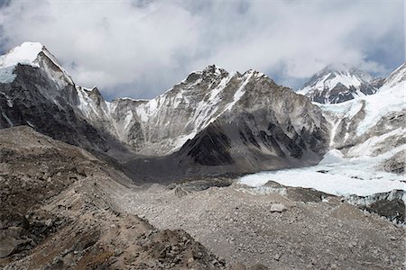 Everest Base Camp at 5350m seen here as a scattering of tents in the distance at the back of the Khumbu glacier, Khumbu Region, Nepal, Himalayas, Asia Stock Photo - Premium Royalty-Free, Code: 6119-08797337