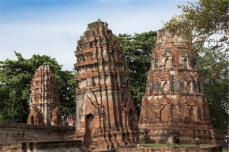 simsearch:841-08542707,k - Khmer style prangs (stupas) (chedis) at Wat Mahathat, Ayutthaya, UNESCO World Heritage Site, Thailand, Southeast Asia, Asia Stock Photo - Premium Royalty-Free, Code: 6119-08703655