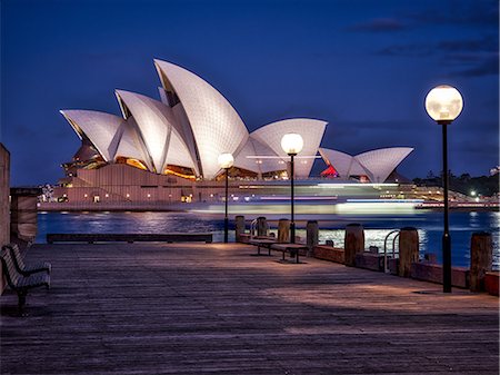 simsearch:841-06340905,k - A boat passes by the Sydney Opera House, UNESCO World Heritage Site, during blue hour, Sydney, New South Wales, Australia, Pacific Photographie de stock - Premium Libres de Droits, Code: 6119-08703682