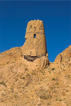 Watchtower at ruins which were once the site of a tall standing Buddha in a niche, Kakrak valley, Bamiyan, Afghanistan, Asia Stock Photo - Premium Royalty-Free, Code: 6119-08739951