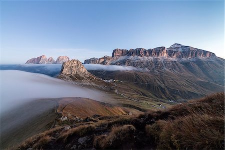 extreme terrain - Piz Boa Sassolungo and Sass Beca shrouded in morning fog Cima Belvedere, Canazei, Val di Fassa, Trentino-Alto Adige, Italy, Europe Stock Photo - Premium Royalty-Free, Code: 6119-08841069