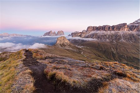 Pink sky and mist on Sass Beca and Sassolungo seen from Cima Belvedere, Canazei, Val di Fassa, Trentino-Alto Adige, Italy, Europe Photographie de stock - Premium Libres de Droits, Code: 6119-08841072