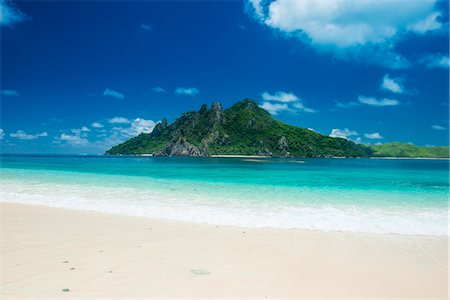 Beautiful white sand beach on Monuriki (Cast Away Island), Mamanuca Islands, Fiji, South Pacific Photographie de stock - Premium Libres de Droits, Code: 6119-08803322