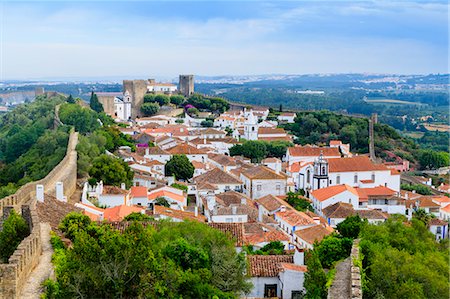 Streets and castle in the medieval walled village of Obidos in Portugal's Centro region, Portugal, Europe Stock Photo - Premium Royalty-Free, Code: 6119-09054037