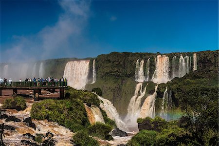 Visitors, drenched in spray, Garganta del Diablo (Devil's Throat), Iguazu Falls, UNESCO World Heritage Site, Iguazu, Brazil, South America Foto de stock - Sin royalties Premium, Código: 6119-09054245