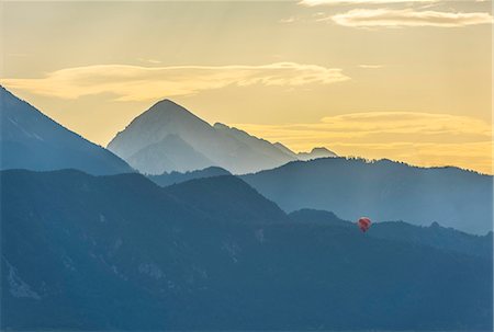 Balloon at sunrise, Bled, Slovenia, Europe Stock Photo - Premium Royalty-Free, Code: 6119-09054201