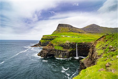 simsearch:6119-09238632,k - Gasadalur waterfall into the ocean, Vagar, Faroe Islands, Denmark, Europe Stock Photo - Premium Royalty-Free, Code: 6119-09062035