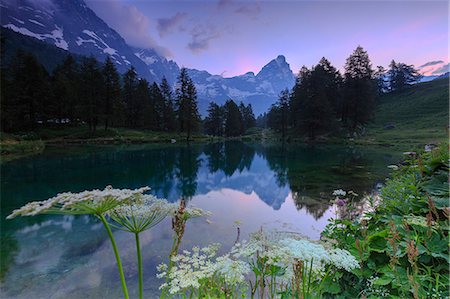 simsearch:6119-09203441,k - Sunrise from famous Blue Lake (Il Lago Blu), Cervinia, Valtournanche, Aosta Valley, Italy, Europe Foto de stock - Sin royalties Premium, Código: 6119-09062107