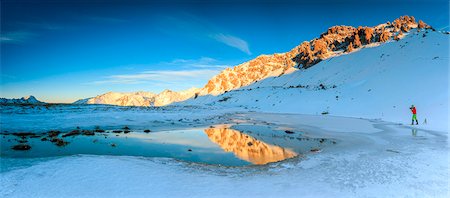 simsearch:6119-09074125,k - Panorama of Lake, Piz Umbrail at dawn with photographer in action framed by snow, Braulio Valley, Valtellina, Lombardy, Italy, Europe Photographie de stock - Premium Libres de Droits, Code: 6119-09074141