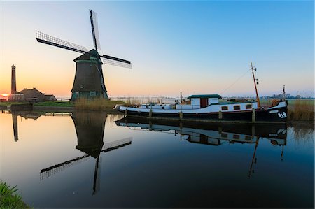 simsearch:6119-09074156,k - Typical windmill reflected in the canal at dawn, Berkmeer, municipality of Koggenland, North Holland, The Netherlands, Europe Stock Photo - Premium Royalty-Free, Code: 6119-09074155