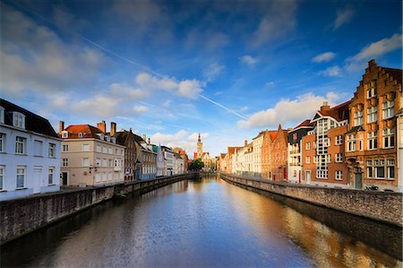 Bright sky at dawn on historic buildings and houses of city centre reflected in the canal, Bruges, West Flanders, Belgium, Europe Photographie de stock - Premium Libres de Droits, Code: 6119-09074175