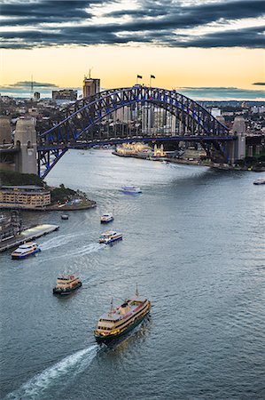View over Sydney harbour after sunset, Sydney, New South Wales, Australia, Pacific Stock Photo - Premium Royalty-Free, Code: 6119-09074273