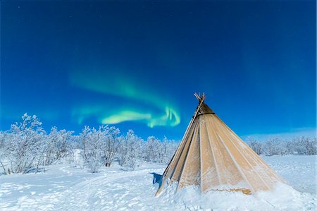 simsearch:841-09076985,k - Isolated Sami tent in the snow under Northern Lights (Aurora Borealis), Abisko, Kiruna Municipality, Norrbotten County, Lapland, Sweden, Scandinavia, Europe Stock Photo - Premium Royalty-Free, Code: 6119-09074215