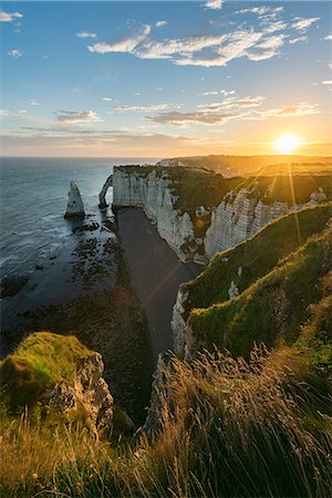 simsearch:6119-09074457,k - Sun rays at dawn at the cliffs, Etretat, Normandy, France, Europe Stock Photo - Premium Royalty-Free, Code: 6119-09074608
