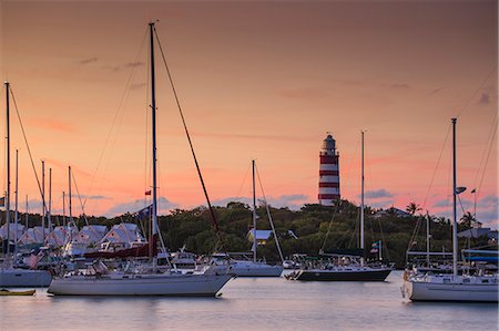 Elbow Reef Lighthouse, the last kerosene burning manned lighthouse in the world, Hope Town, Elbow Cay, Abaco Islands, Bahamas, West Indies, Central America Photographie de stock - Premium Libres de Droits, Code: 6119-09085403