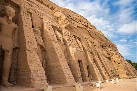 egyptian hieroglyphs - The small temple, dedicated to Nefertari and adorned with statues of the King and Queen, Abu Simbel, UNESCO World Heritage Site, Egypt, North Africa, Africa Stock Photo - Premium Royalty-Free, Code: 6119-09085429