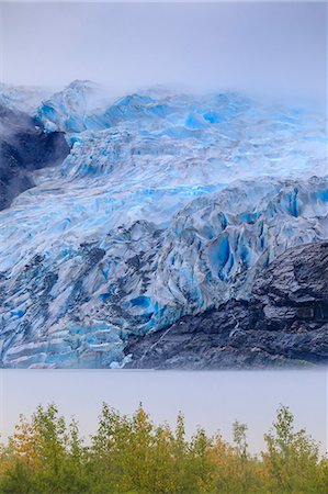 simsearch:6119-09085502,k - Bright blue ice of Mendenhall Glacier flowing from Juneau Ice Field, mist on Mendenhall Lake, Juneau, Alaska, United States of America, North America Fotografie stock - Premium Royalty-Free, Codice: 6119-09085503