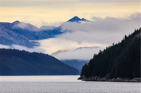 parco nazionale della baia del ghiacciaio - Mist over the Fairweather Range, Icy Strait, between Chichagof Island and Glacier Bay National Park, UNESCO World Heritage Site, Inside Passage, Alaska, United States of America, North America Fotografie stock - Premium Royalty-Free, Codice: 6119-09085517