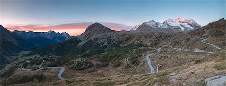 simsearch:6119-08062111,k - Panoramic of the road bends of Bernina Pass at dawn, Poschiavo Valley, Engadine, Canton of Graubunden, Switzerland, Europe Foto de stock - Sin royalties Premium, Código: 6119-09085538