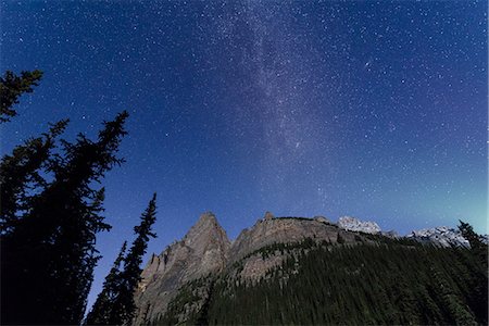 Milky way rises over the Canadian Rockies in the Yoho National Park, with moonlight cast on the mountain and Aurora over horizon, UNESCO World Heritage Site, Canadian Rockies, Alberta, Canada, North America Photographie de stock - Premium Libres de Droits, Code: 6119-09085651