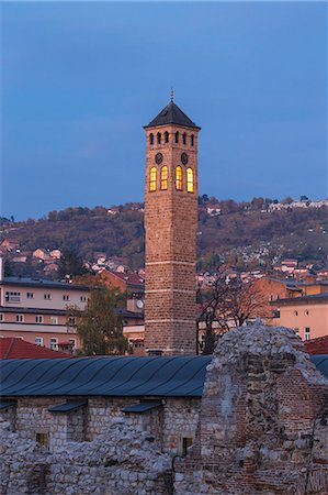 Taslihan, an ancient caravanserai and clock tower, Bascarsija (The Old Quarter), Sarajevo, Bosnia and Herzegovina, Europe Stock Photo - Premium Royalty-Free, Code: 6119-09147109