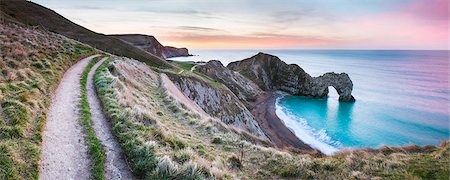 Durdle Door at sunrise, Lulworth Cove, Jurassic Coast, UNESCO World Heritage Site, Dorset, England, United Kingdom, Europe Stockbilder - Premium RF Lizenzfrei, Bildnummer: 6119-09147295