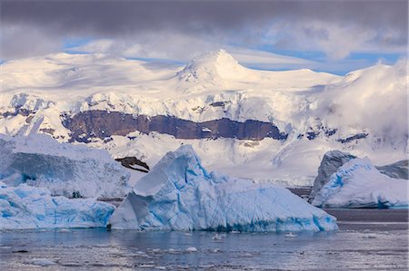 snowy mountain - Blue icebergs and mountains, off Cuverville Island, Errera Channel, Danco Coast, Antarctic Peninsula, Antarctica, Polar Regions Stock Photo - Premium Royalty-Free, Code: 6119-09156450