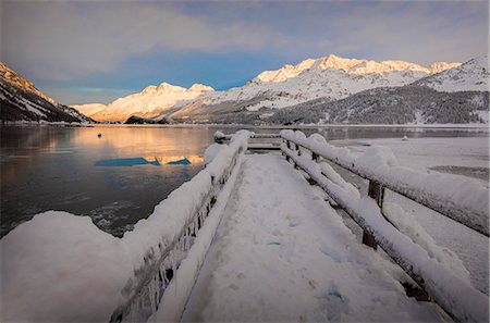 Walkway covered with snow, Lake Sils, Plaun da Lej, Maloja Region, Canton of Graubunden, Engadine, Switzerland, Europe Stock Photo - Premium Royalty-Free, Code: 6119-09161656