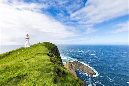 simsearch:6119-09161686,k - Lighthouse on islet known as Mykines Holmur, Mykines Island, Faroe Islands, Denmark, Europe Foto de stock - Sin royalties Premium, Código: 6119-09161680