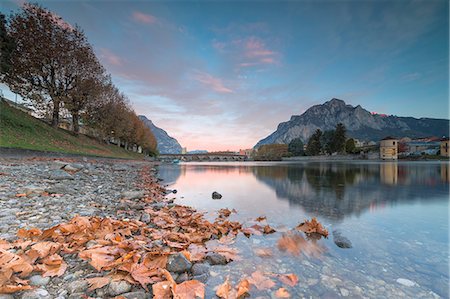 sunrise over water - Sunrise on River Adda, Lecco, Lombardy, Italy, Europe Stock Photo - Premium Royalty-Free, Code: 6119-09161705