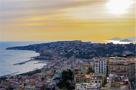 Panoramic sunset view of Mergellina coastal section seen from Sant Elmo castle in Naples, Campania, Italy, Europe Stock Photo - Premium Royalty-Free, Code: 6119-09161803