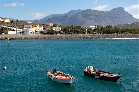 Boats in the harbour, Playa de la Aldea at Los Caserones on the wild west coast of Gran Canaria, Canary Islands, Spain, Atlantic, Europe Stock Photo - Premium Royalty-Free, Code: 6119-09161920