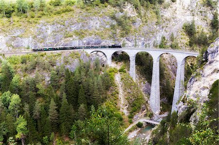 simsearch:6119-07845678,k - Steam train crosses the Landwasser Viadukt, UNESCO World Heritage Site, Filisur, Albula Valley, Graubunden, Switzerland, Europe Stock Photo - Premium Royalty-Free, Code: 6119-09170198