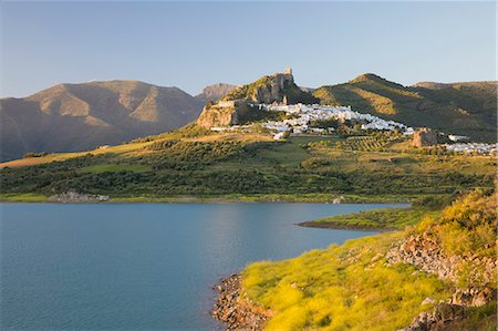 Moorish castle above white village and reservoir, Zahara de la Sierra, Sierra de Grazalema Natural Park, Andalucia, Spain, Europe Stock Photo - Premium Royalty-Free, Code: 6119-09170347