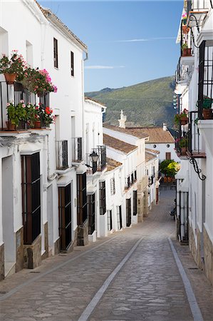 Narrow street in Andalucian white village, Zahara de la Sierra, Sierra de Grazalema Natural Park, Andalucia, Spain, Europe Stock Photo - Premium Royalty-Free, Code: 6119-09170348