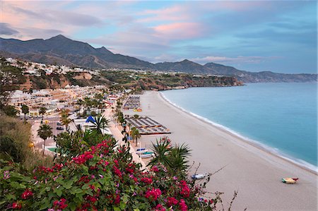 Sunset view over Nerja Playa Burriana beach, Nerja, Malaga Province, Costa del Sol, Andalucia, Spain, Europe Stock Photo - Premium Royalty-Free, Code: 6119-09170353