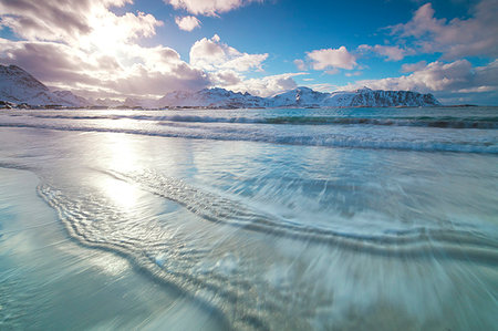 sunset, beach - Waves of the icy sea, Ramberg, Flakstad municipality, Lofoten Islands, Nordland, Norway, Europe Stock Photo - Premium Royalty-Free, Code: 6119-09182552